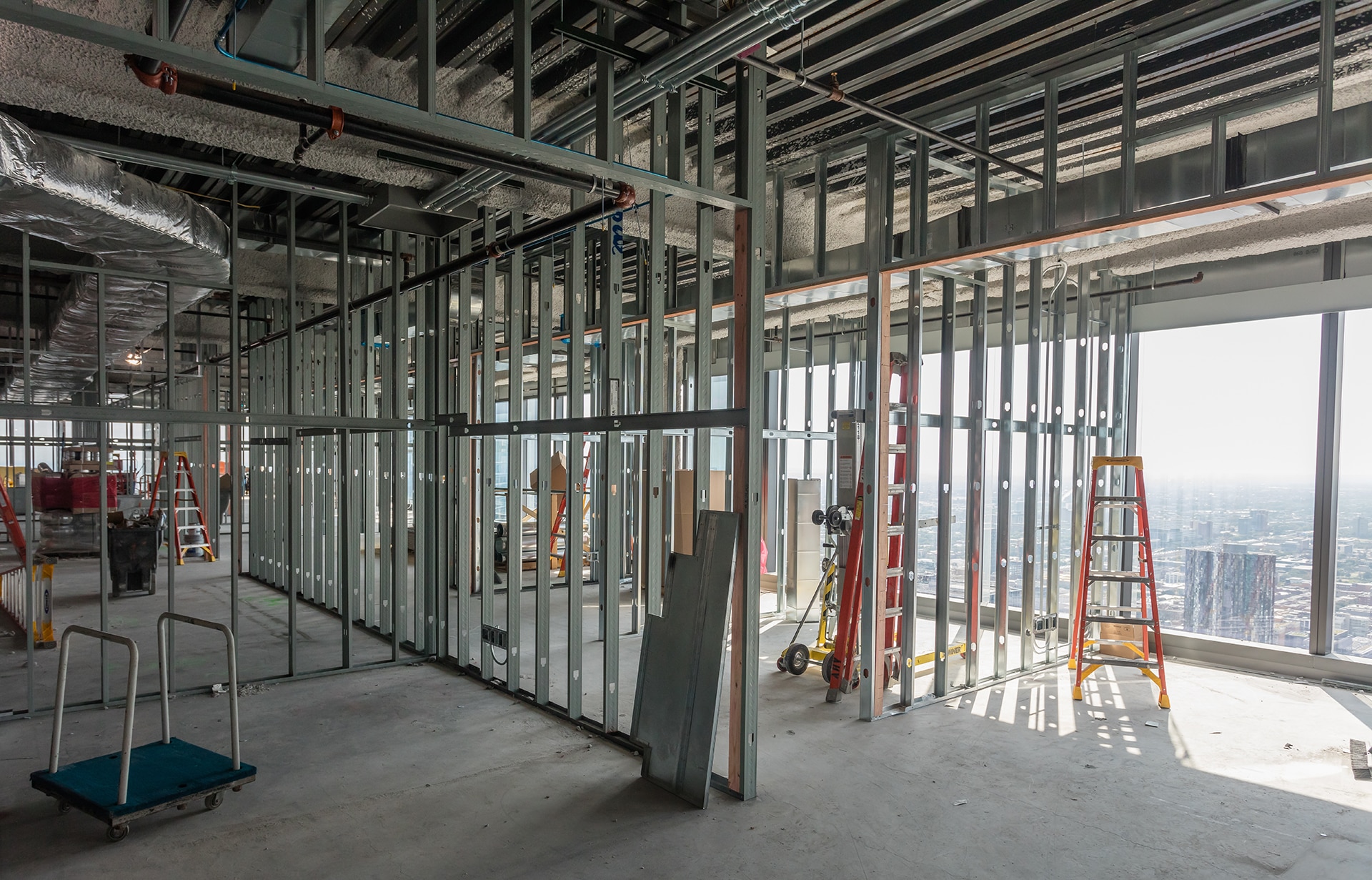 High rise office under construction on sunny day